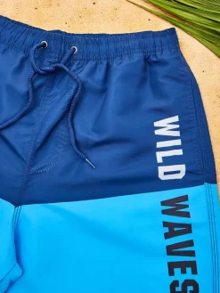 Spodnie^Royalfashion Sportowe męskie krótkie spodenki z ochronną siateczką Głęboki błękit nieba