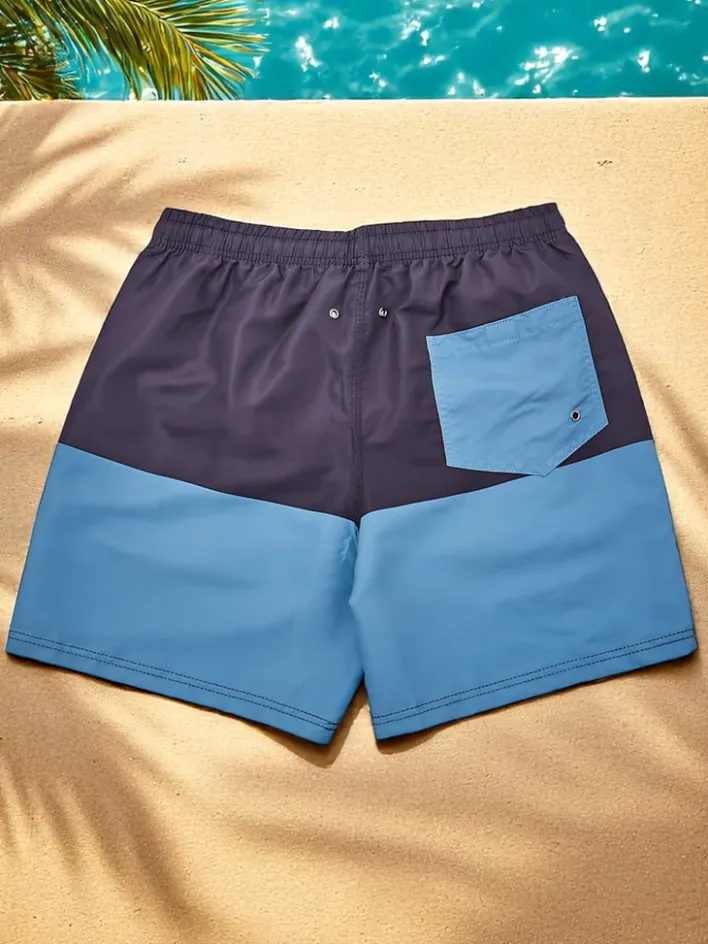 Spodnie^Royalfashion Sportowe męskie krótkie spodenki z ochronną siateczką Jasnoniebieski