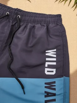 Spodnie^Royalfashion Sportowe męskie krótkie spodenki z ochronną siateczką Jasnoniebieski