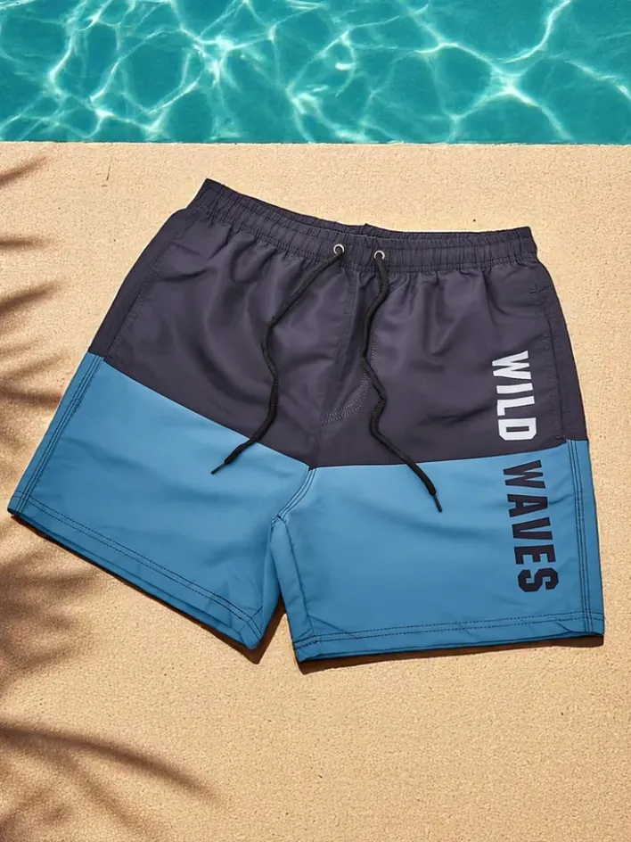 Spodnie^Royalfashion Sportowe męskie krótkie spodenki z ochronną siateczką Jasnoniebieski