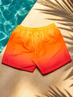 Spodnie^Royalfashion Sportowe męskie krótkie spodenki ombre z ochronną siateczką pomarańczowy