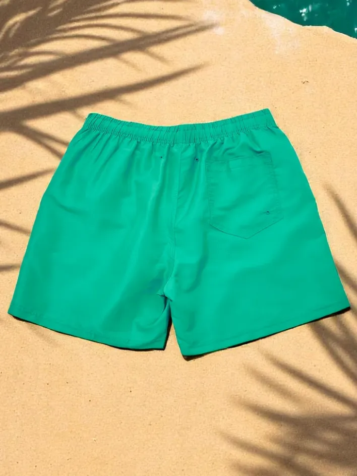 Spodnie^Royalfashion Sportowe męskie krótkie spodenki z ochronną siateczką Szmaragdowa zieleń