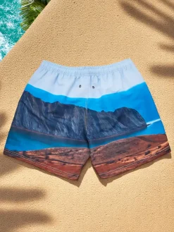 Spodnie^Royalfashion Sportowe męskie krótkie spodenki z ochronną siateczką Jasnoniebieski