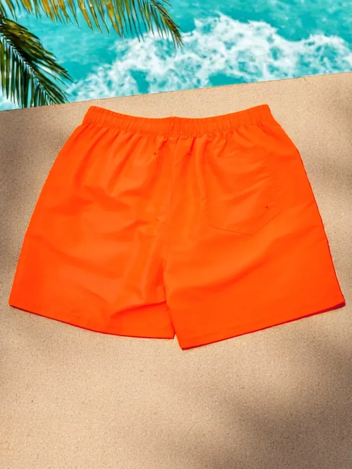 Spodnie^Royalfashion Sportowe męskie krótkie spodenki z ochronną siateczką pomarańczowy