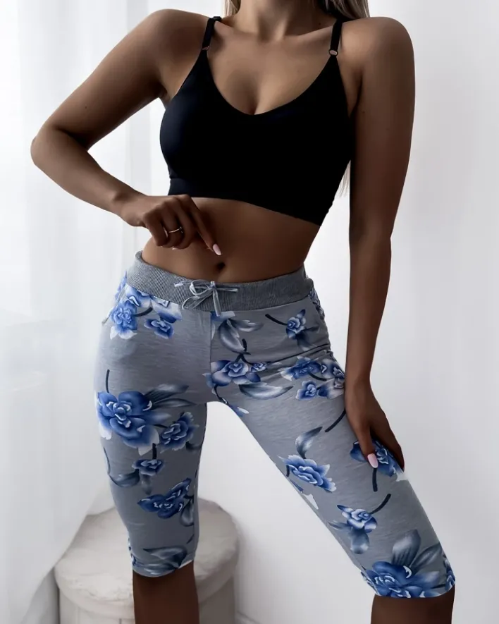 Spodenki 3/4|Krótkie Spodenki^Royalfashion Szare damskie spodenki 3/4 z kwiatowym wzorem gołębi szary