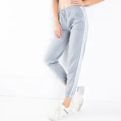 Spodnie Dresowe^Royalfashion Szare damskie spodnie dresowe z lampasami Jasny szary