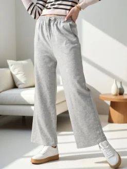 Spodnie Materiałowe|Spodnie Dresowe^Royalfashion Wiskozowe szerokie spodnie damskie dresowe gołębi szary