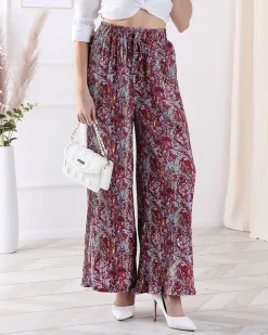 Spodnie Materiałowe^Royalfashion Wzorzyste szerokie spodnie damskie w kolorze m czerwony