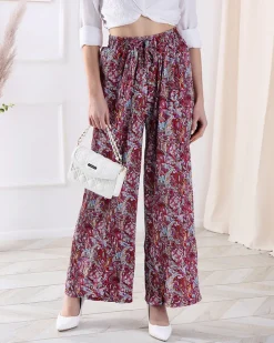 Spodnie Materiałowe^Royalfashion Wzorzyste szerokie spodnie damskie w kolorze m czerwony