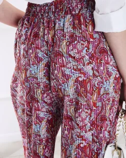 Spodnie Materiałowe^Royalfashion Wzorzyste szerokie spodnie damskie w kolorze m czerwony