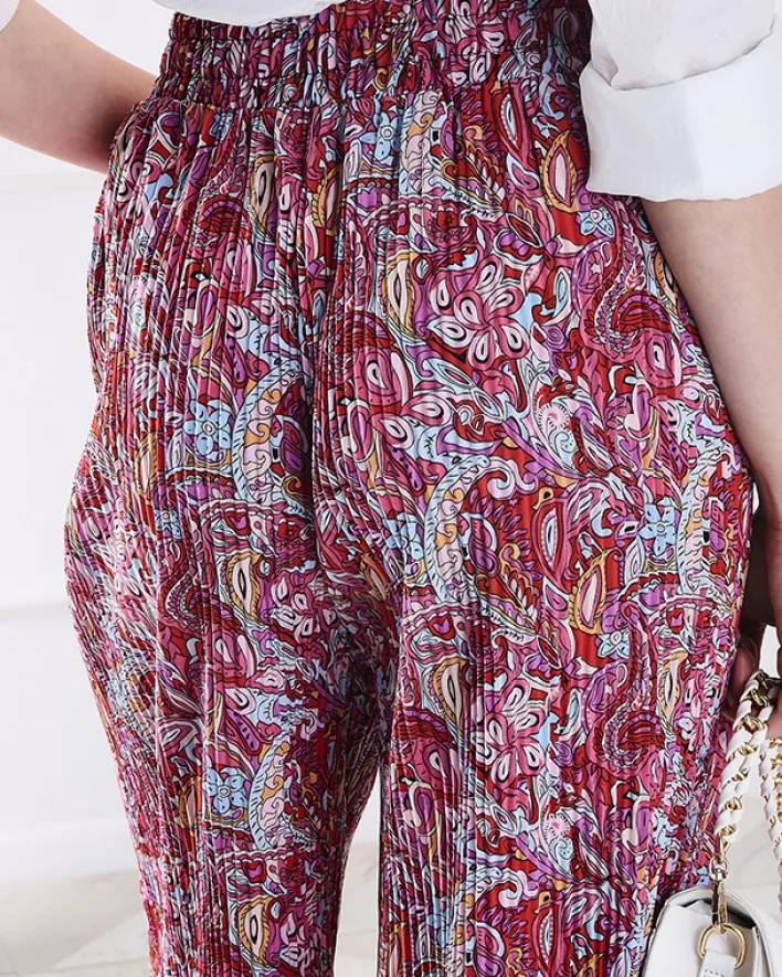 Spodnie Materiałowe^Royalfashion Wzorzyste szerokie spodnie damskie w kolorze m czerwony