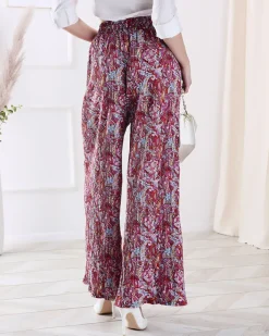 Spodnie Materiałowe^Royalfashion Wzorzyste szerokie spodnie damskie w kolorze m czerwony