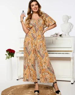 Kombinezony^Royalfashion Wzorzysty kombinezon damski w kolorze m pomarańczowy