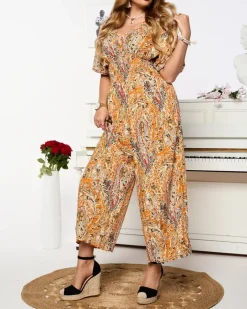 Kombinezony^Royalfashion Wzorzysty kombinezon damski w kolorze m pomarańczowy