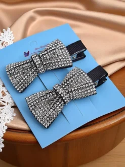 Akcesoria Do Włosów^Royalfashion Zestaw 2 spinek do włosów z kokardkami z cyrkoniami Isadora srebrny