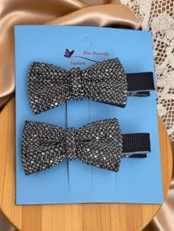 Akcesoria Do Włosów^Royalfashion Zestaw 2 spinek do włosów z kokardkami z cyrkoniami Isadora srebrny